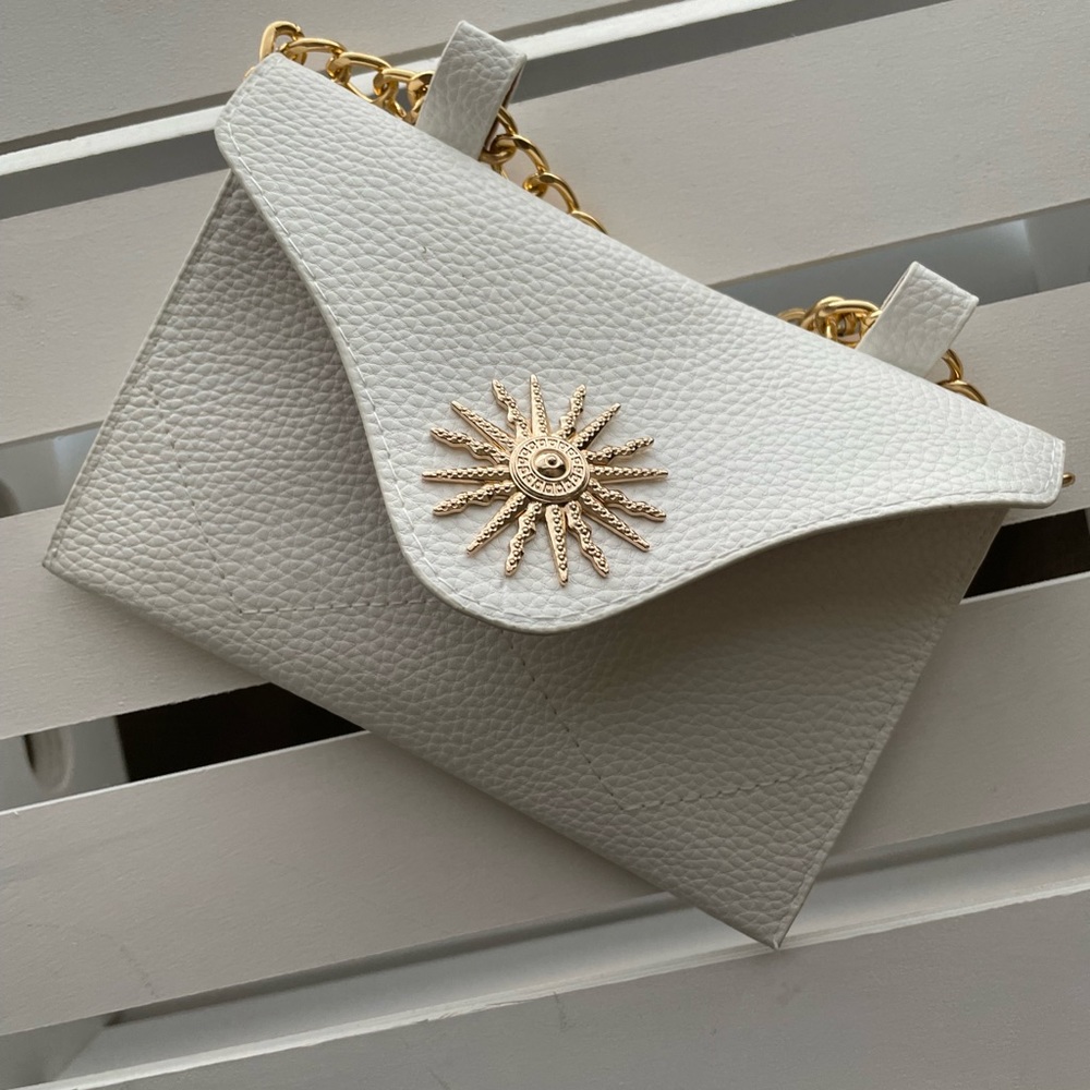 Leather white and gold belt bag. Brand new never used